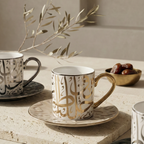 Mise en scène Ramadan avec tasses calligraphie, dattes et branche d'olivier sur pierre naturelle.